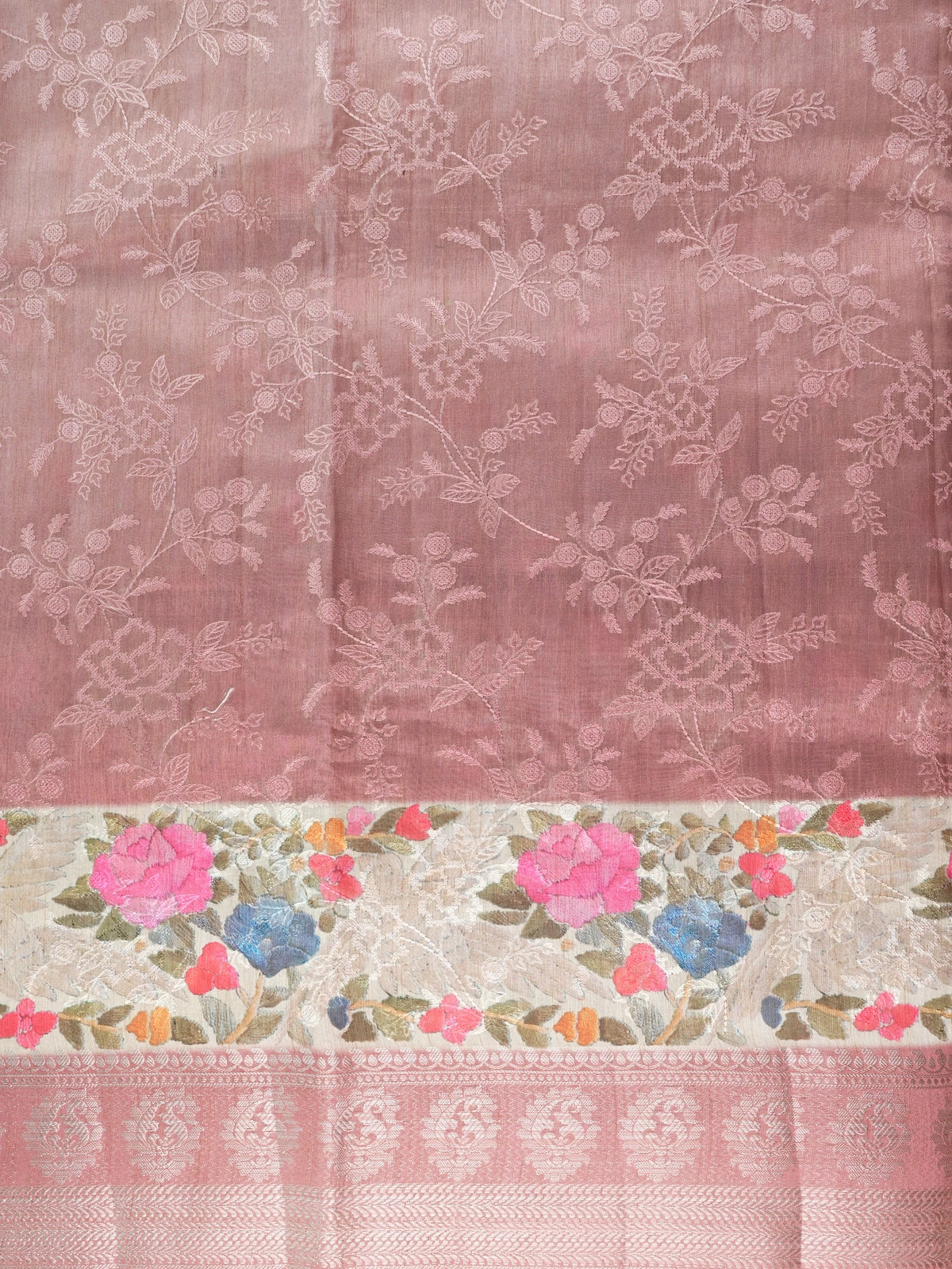 Dusty rose-pink designer saree with tonal floral embroidery and multicolour cream floral border