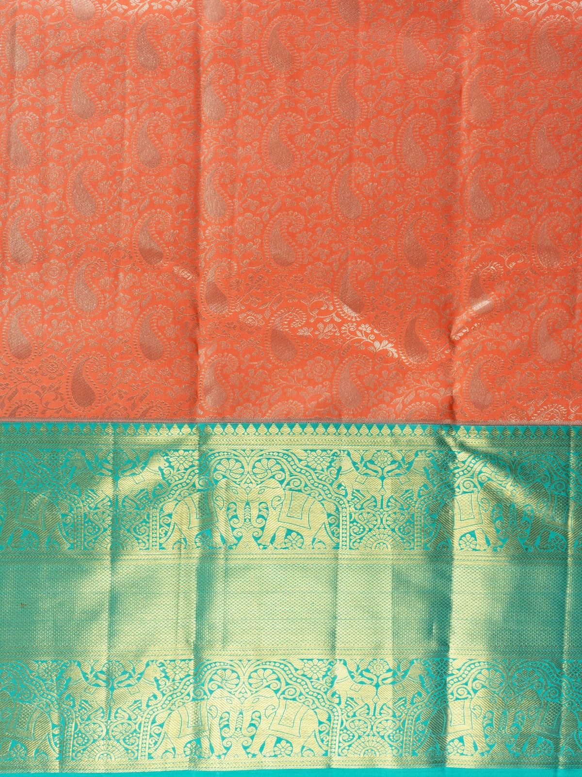 Coral orange pure Kanchipuram silk saree with teal green gold zari elephant border and matching blouse