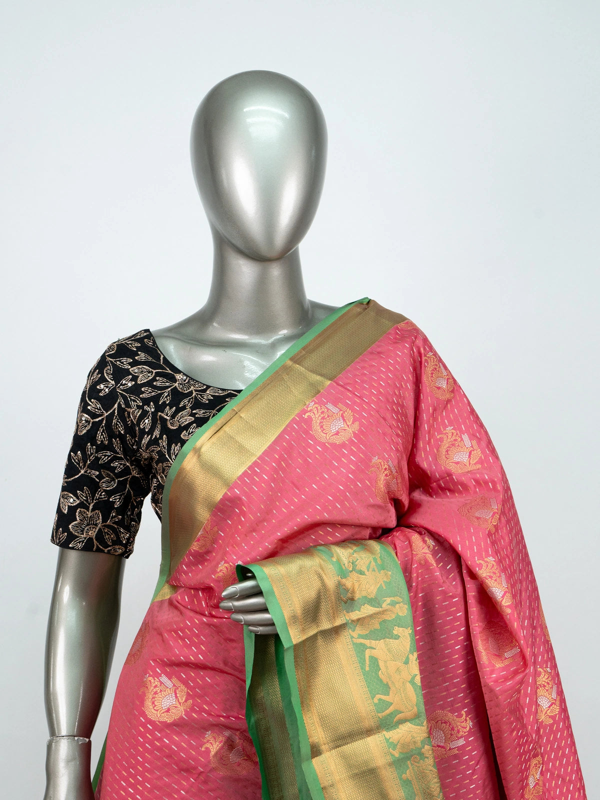 Pink soft silk saree with green and gold zari contrast border and floral brocade pallu