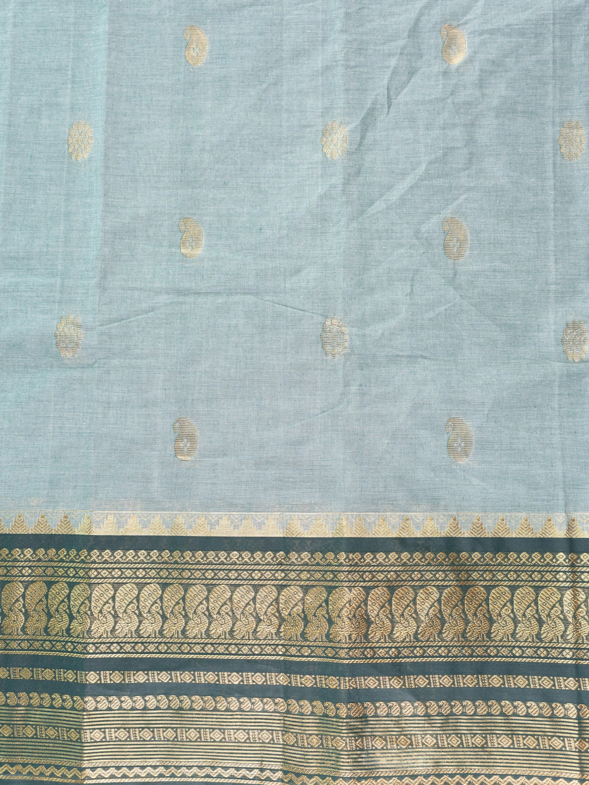 Sage green Chettinad cotton saree with teal gold zari contrast border and paisley buttas
