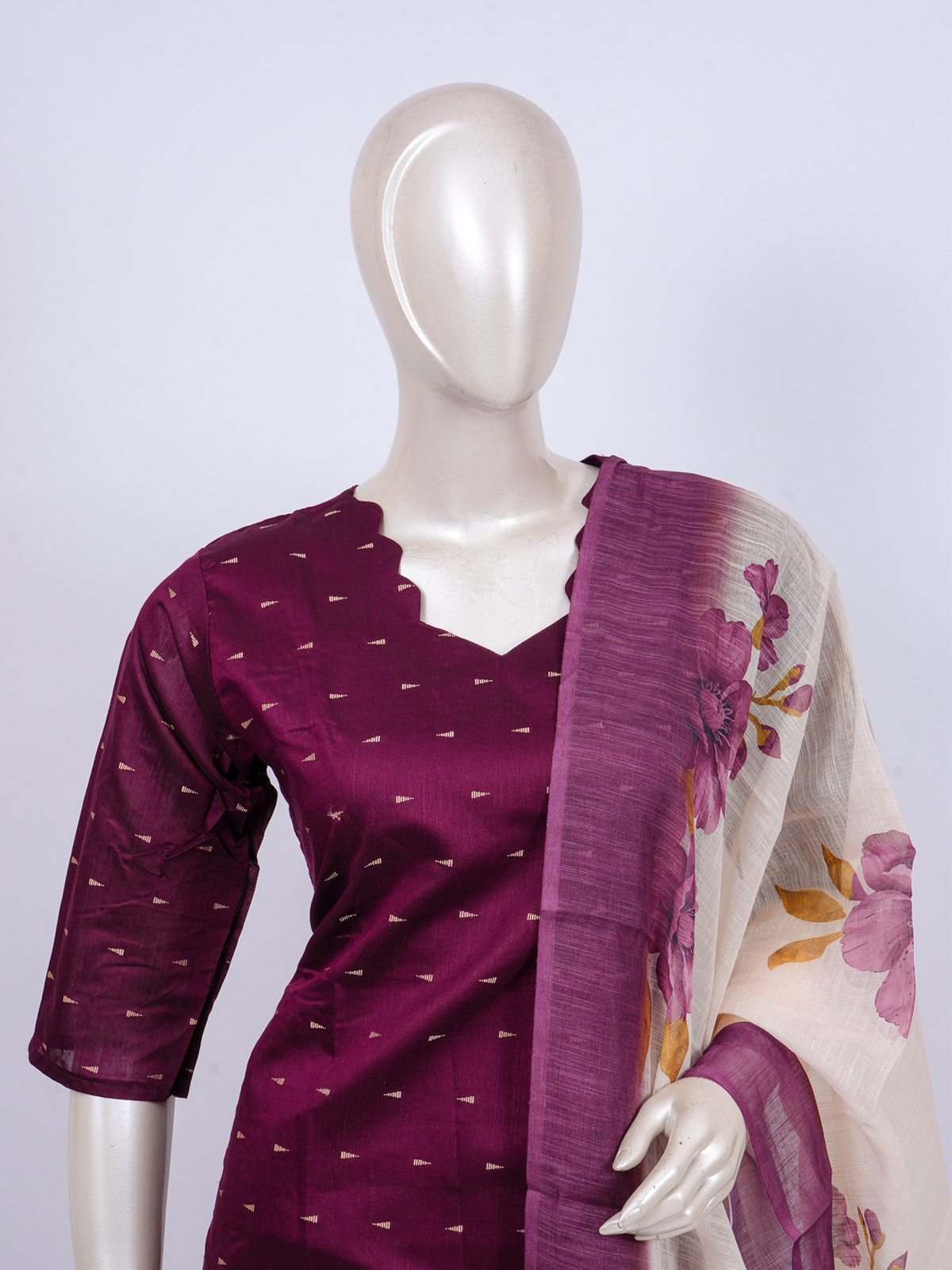 Purple zari butti kurti set with floral cream dupatta and beige straight pants