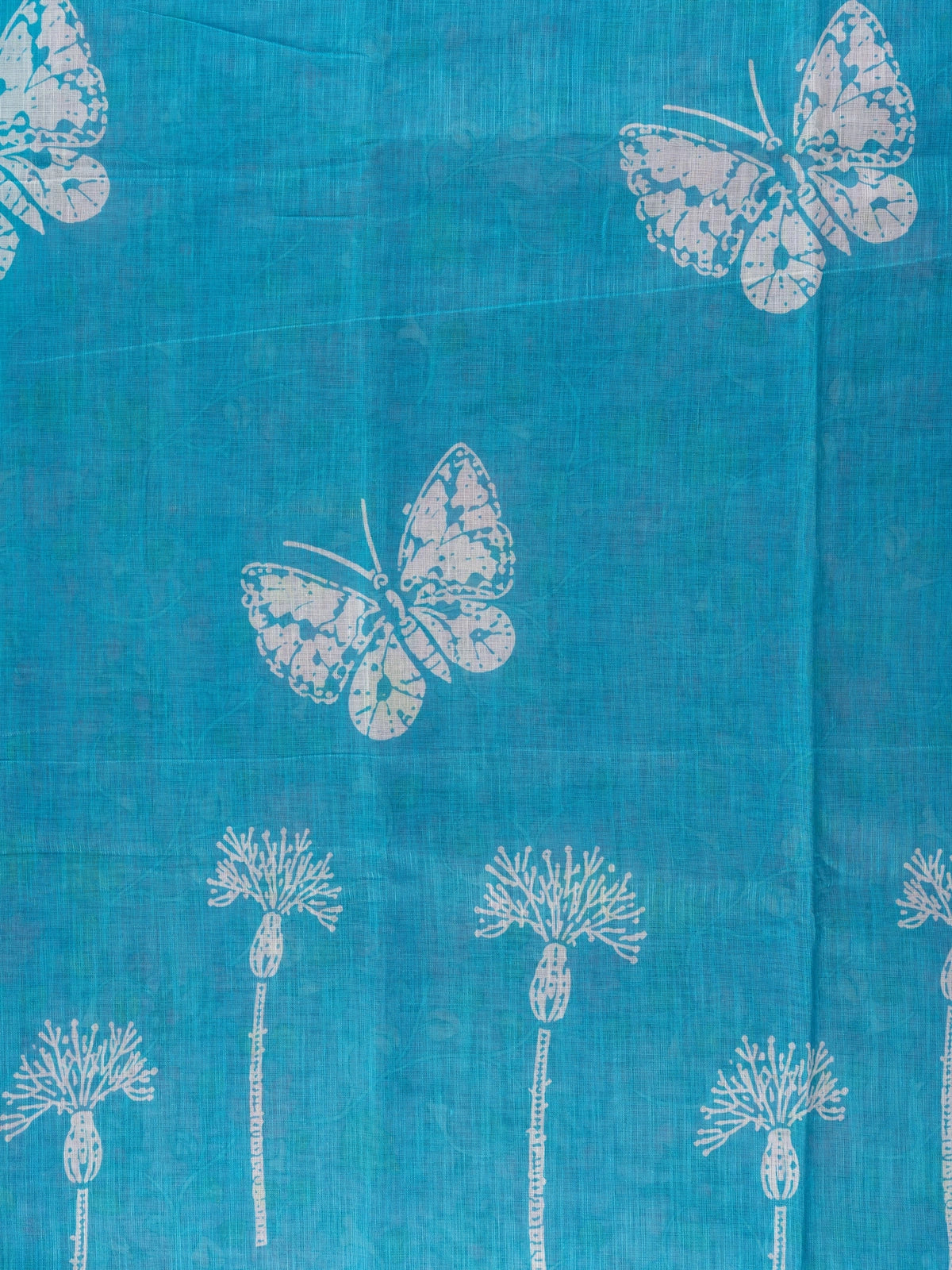 Turquoise blue linen cotton saree with white butterfly prints and a contrast purple Kalamkari pallu