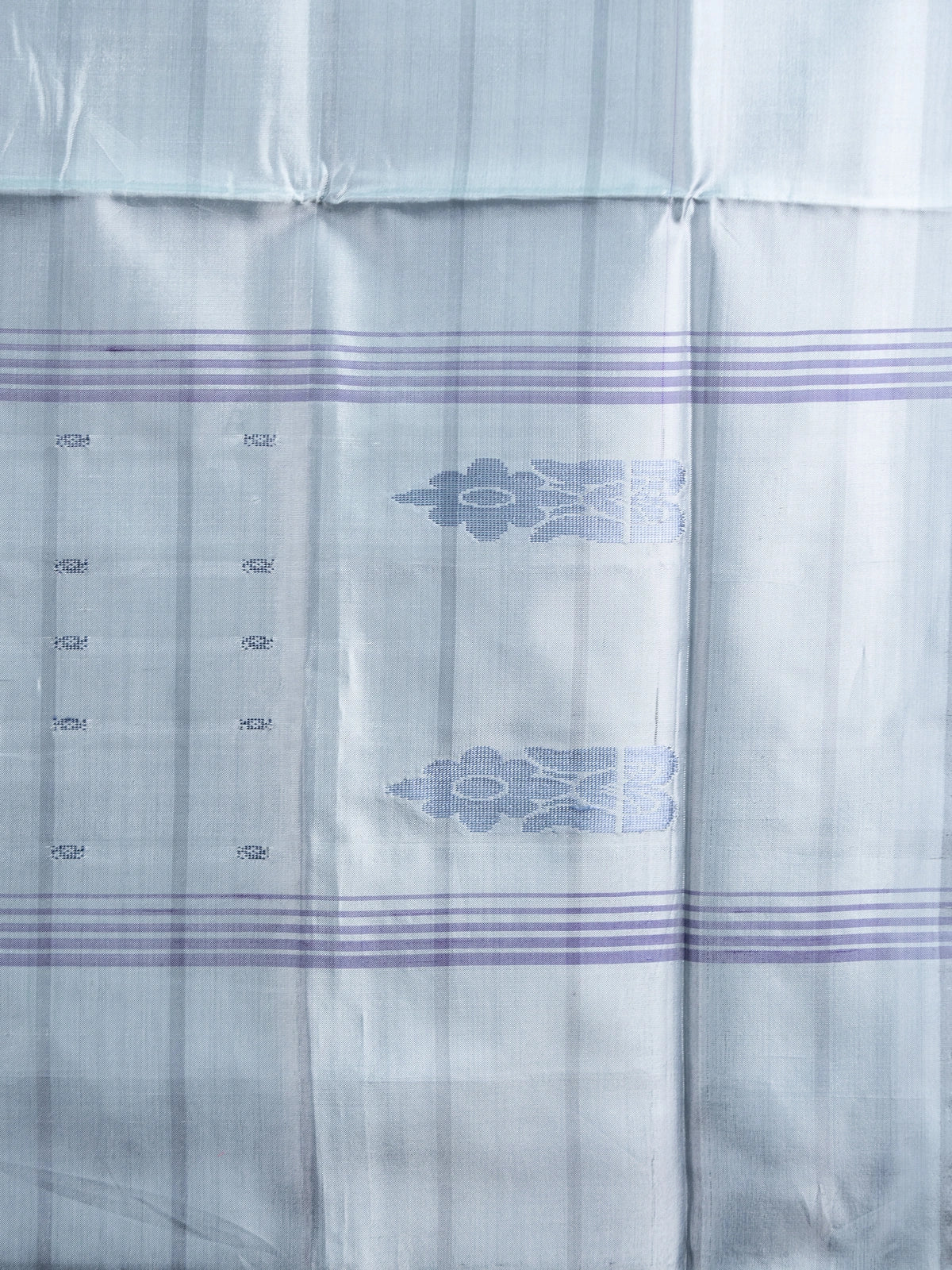 Violet banana silk saree with white and silver checks and contrast grey striped pallu