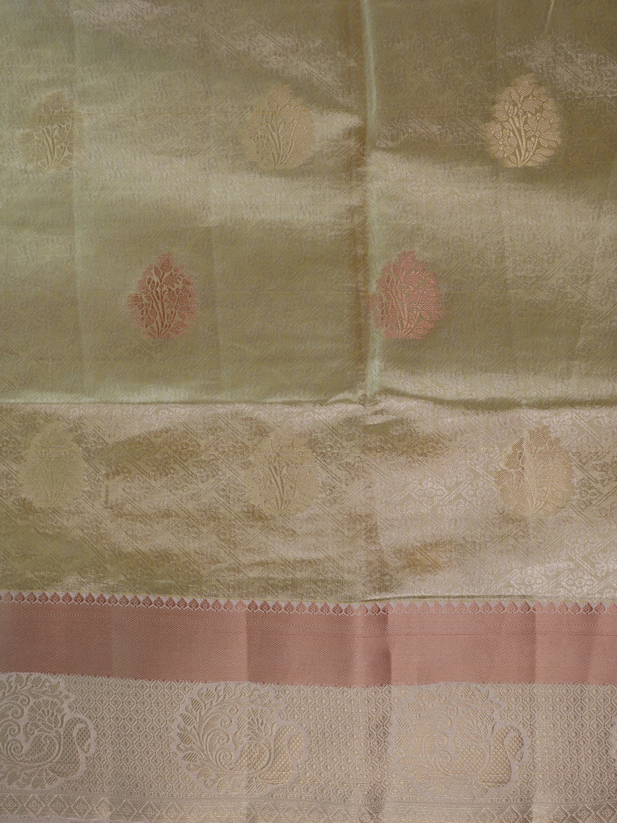 Cream gold semi tussar saree with woven floral zari buta and contrast peach border