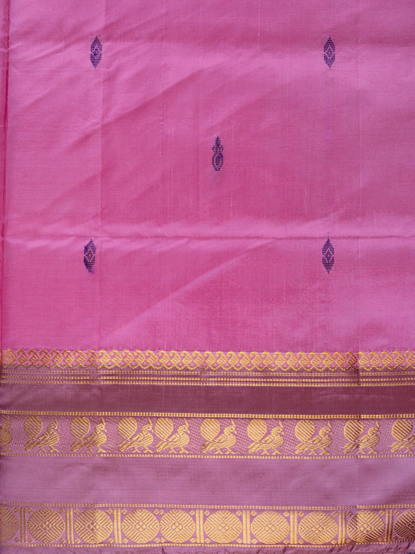 Pink banana silk saree with contrast purple gold zari border and buttis