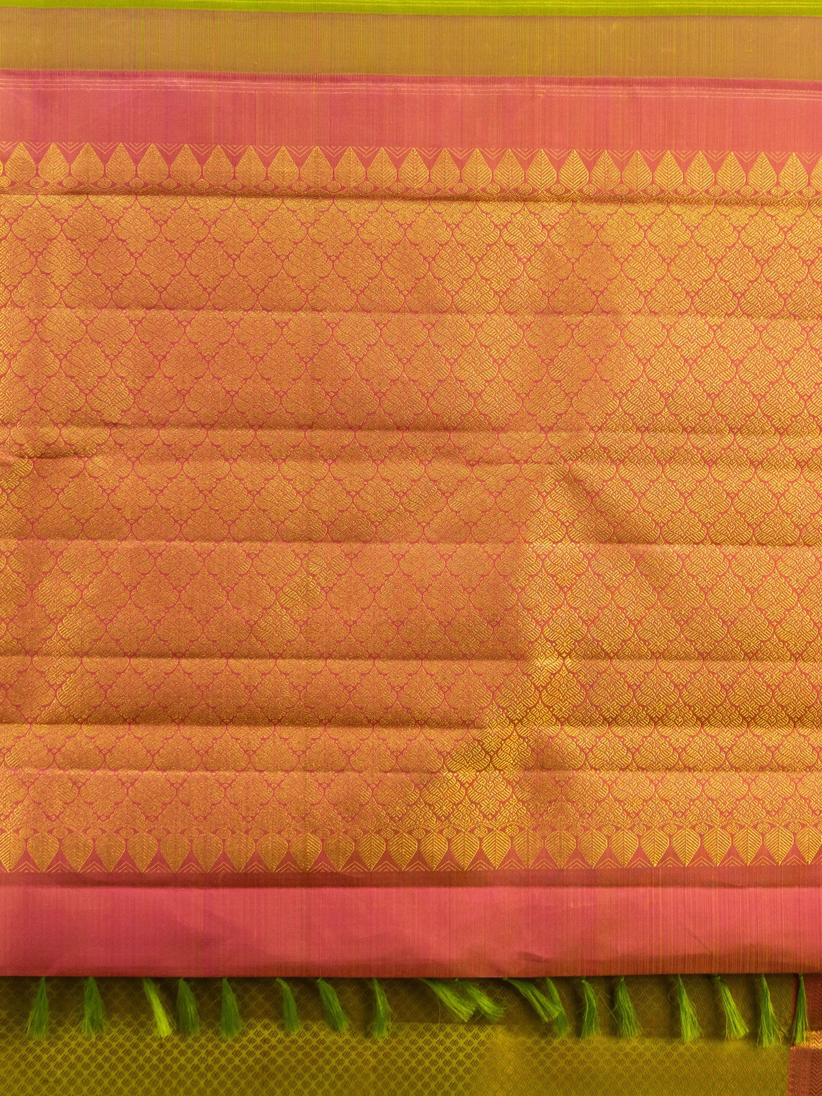 Mehendi green pure Kanchipuram silk saree with contrast pink gold zari border and pallu