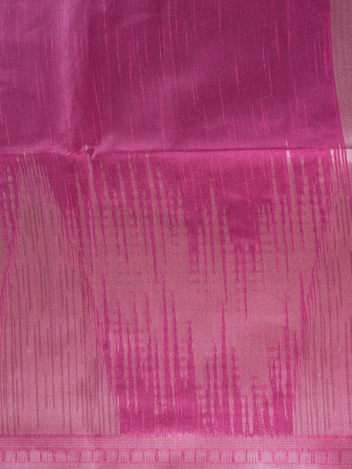 Magenta pink semi tussar saree with silver zari ikat streaks and temple-design pallu