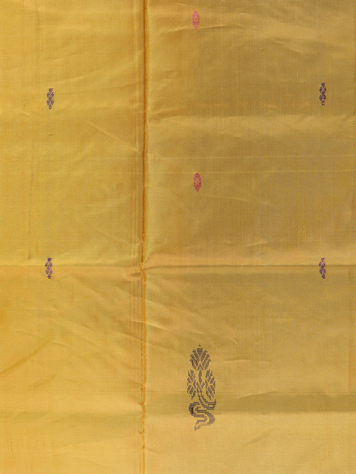 Mustard yellow banana silk saree with royal blue contrast pallu, border and scattered buttas
