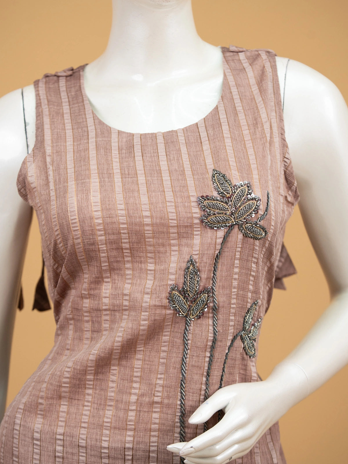 Dusty mauve striped cotton sleeveless straight cut kurti set with beaded floral embroidery and matching pants