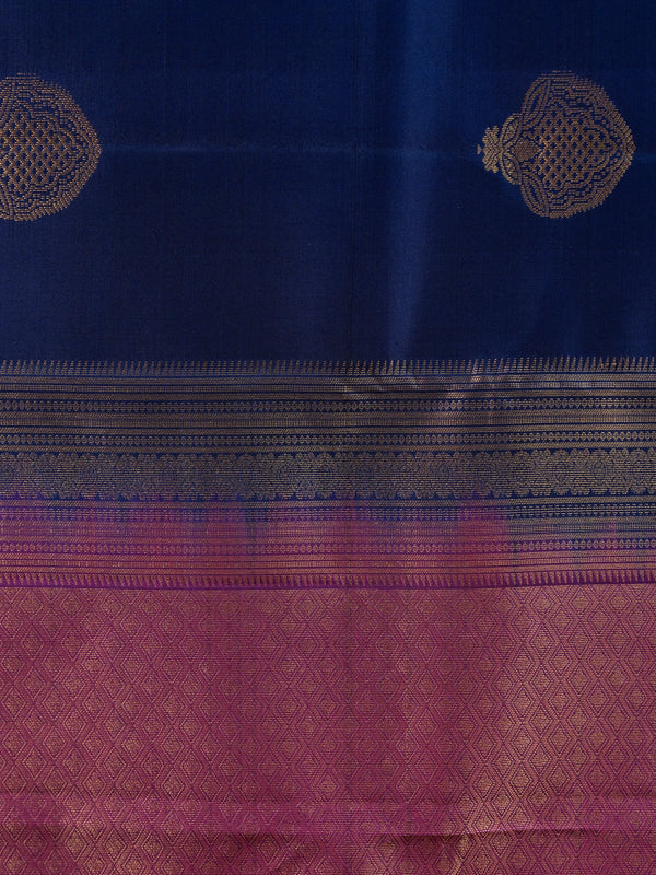 Navy blue pure Kanchipuram silk saree with magenta contrast border and gold zari buta motifs