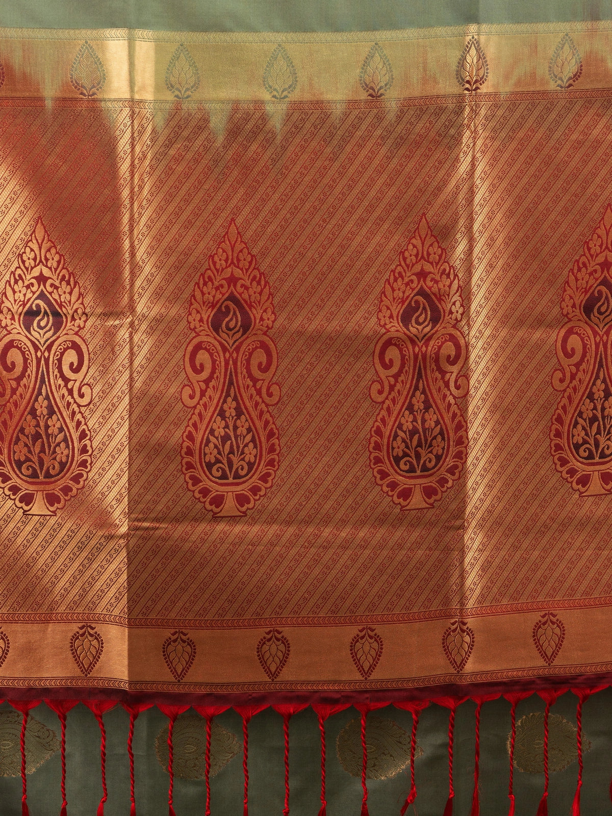 Olive green Kanchipuram fancy silk saree with contrast maroon and gold zari border and paisley pallu