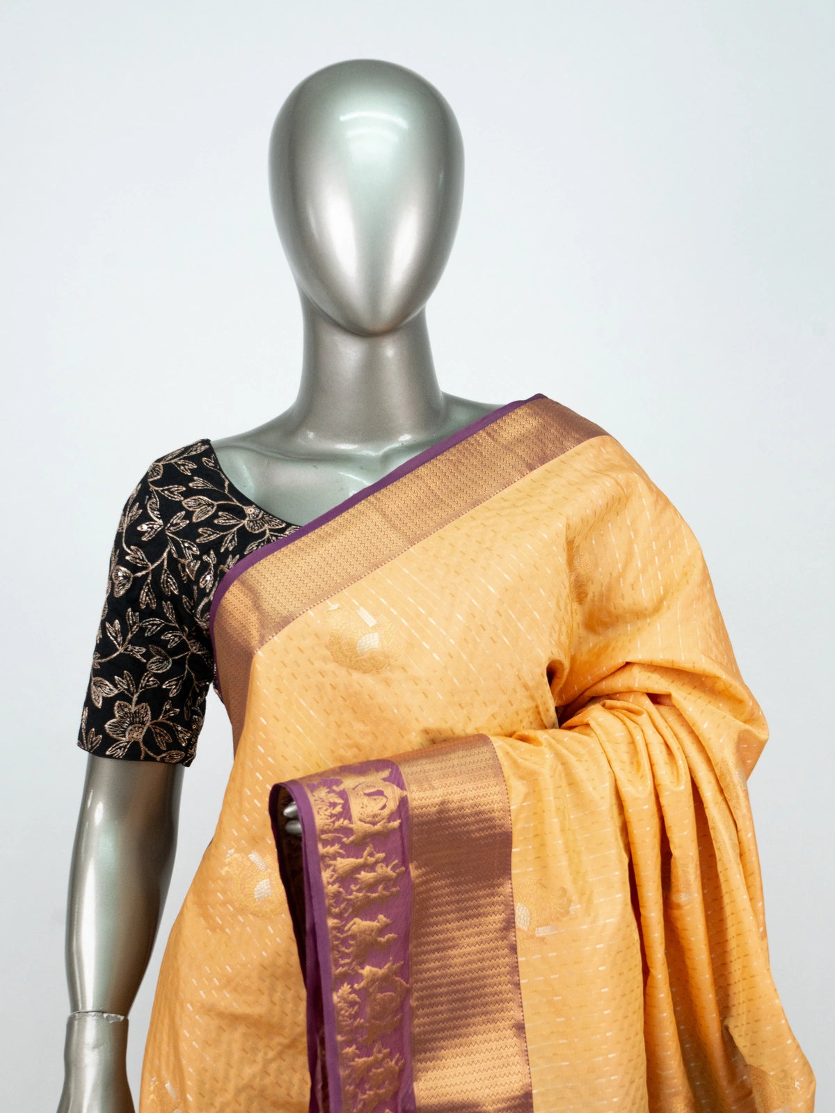 Marigold soft silk saree with contrast wine purple and gold zari temple border and ornate pallu