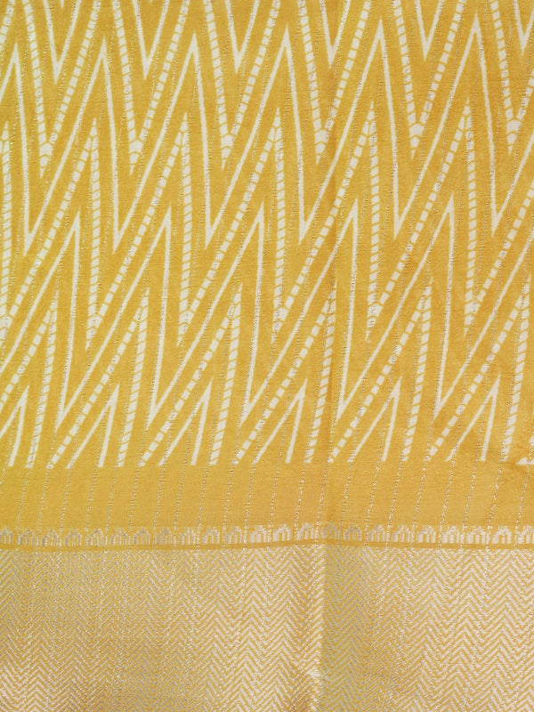 Yellow and white designer saree with zigzag print, gold zari border and tree motif pallu