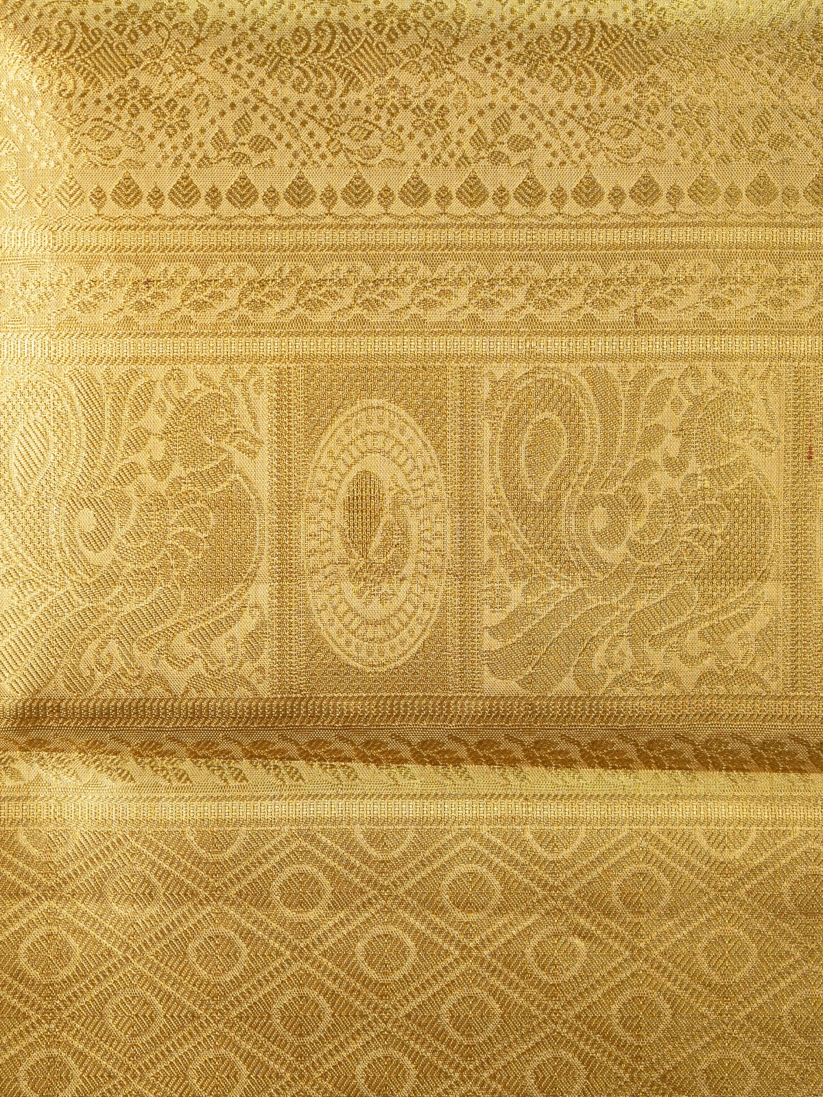 Gold pure Kanchipuram silk saree with all-over zari weave and ornate paisley-peacock pallu