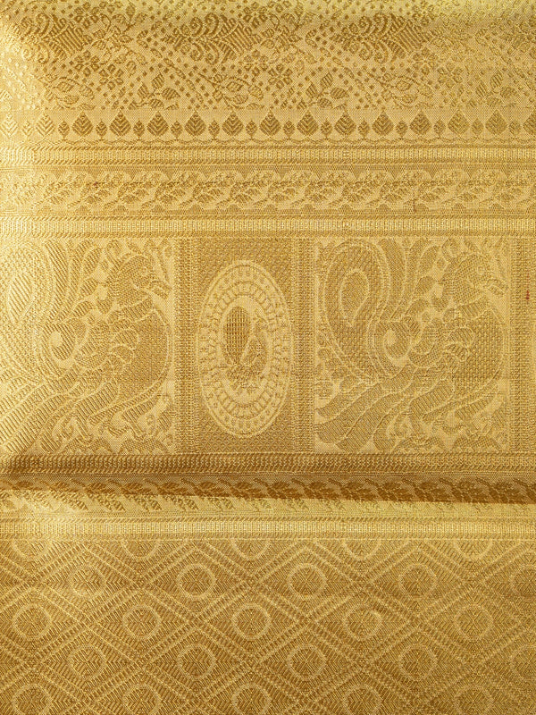 Gold pure Kanchipuram silk saree with all-over zari weave and ornate paisley-peacock pallu