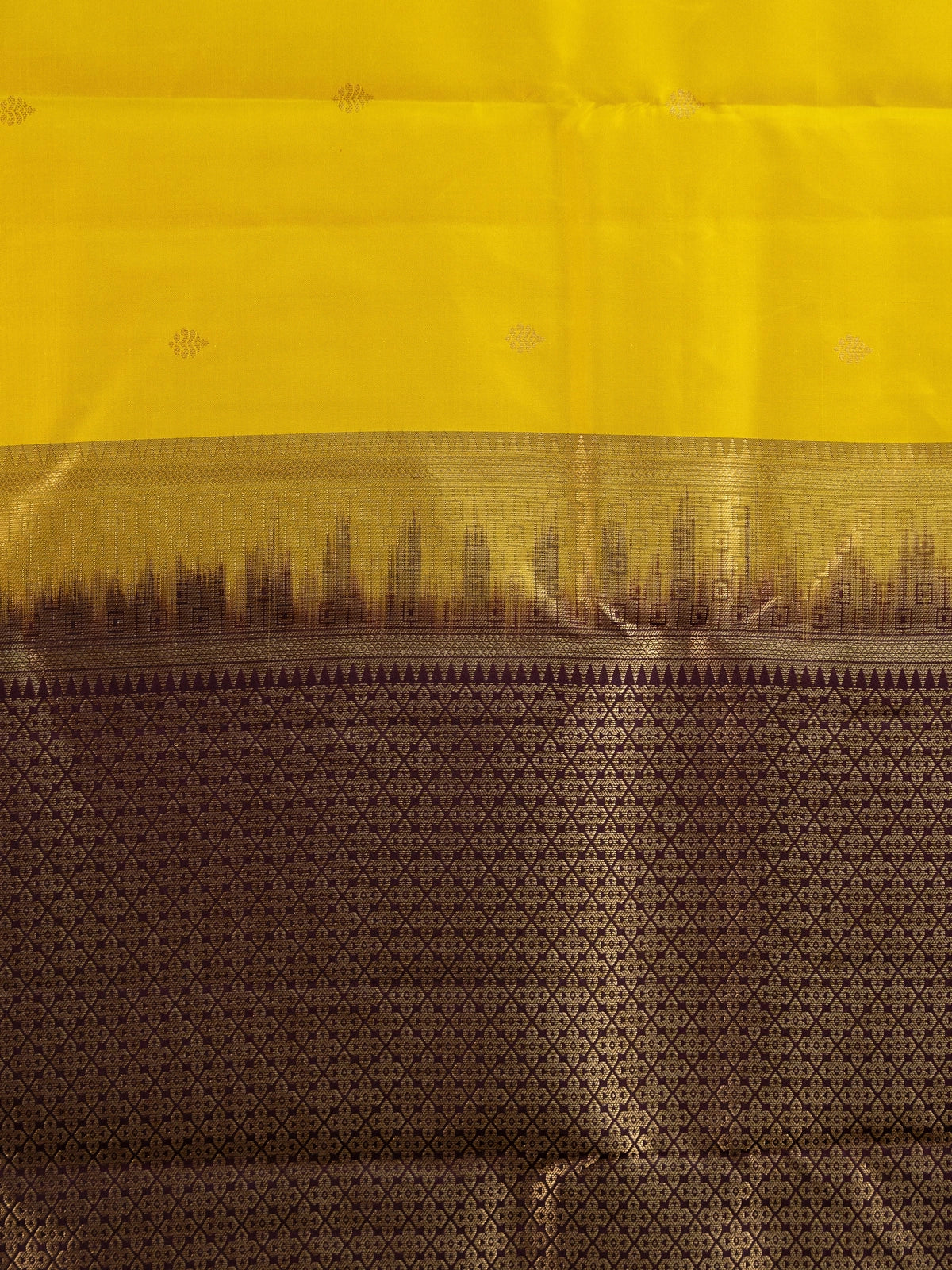 Yellow pure Kanchipuram silk saree with contrast wine border and gold zari brocade pallu