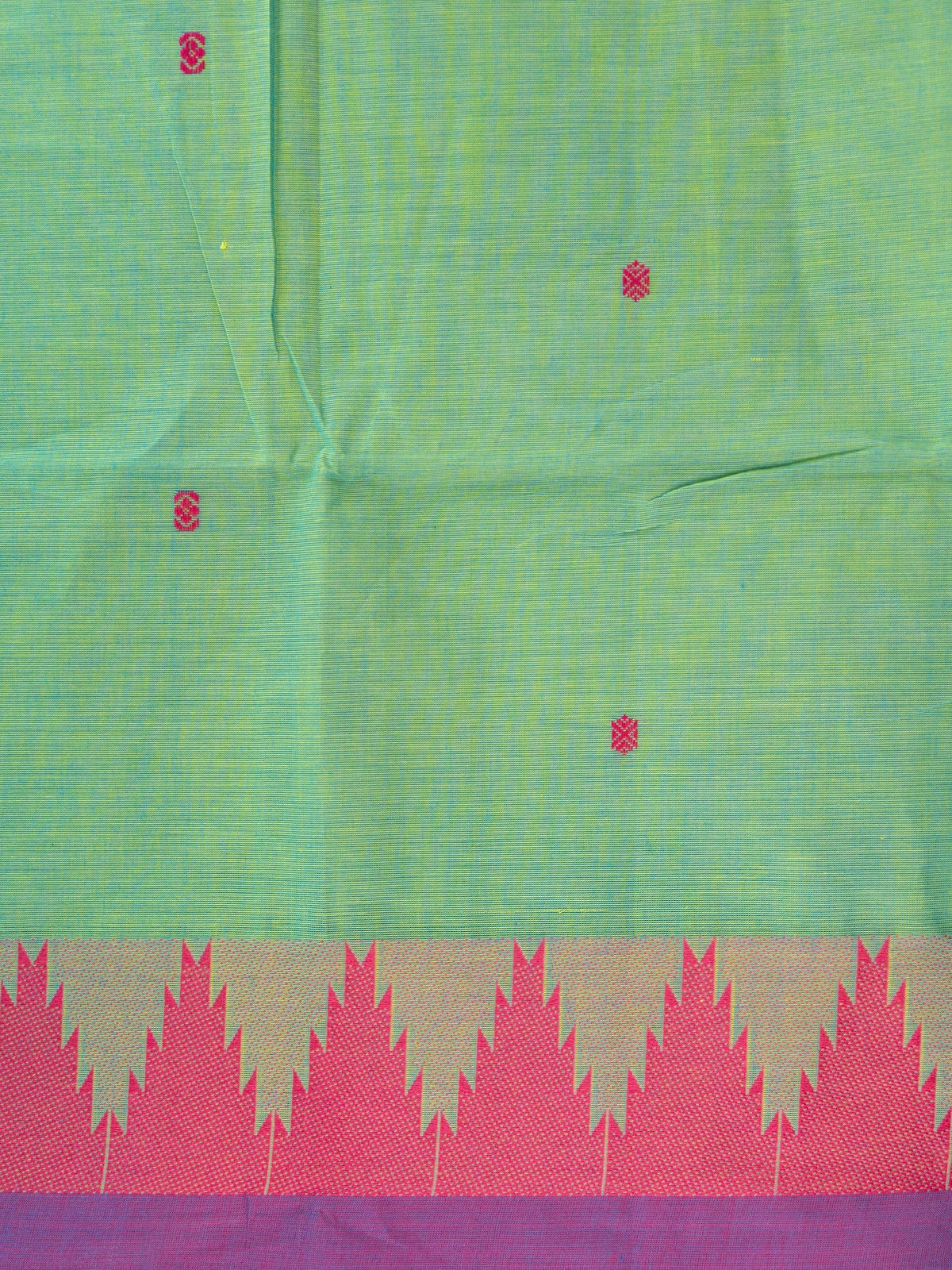 Green Chettinad cotton saree with pink and purple temple border and woven buttas