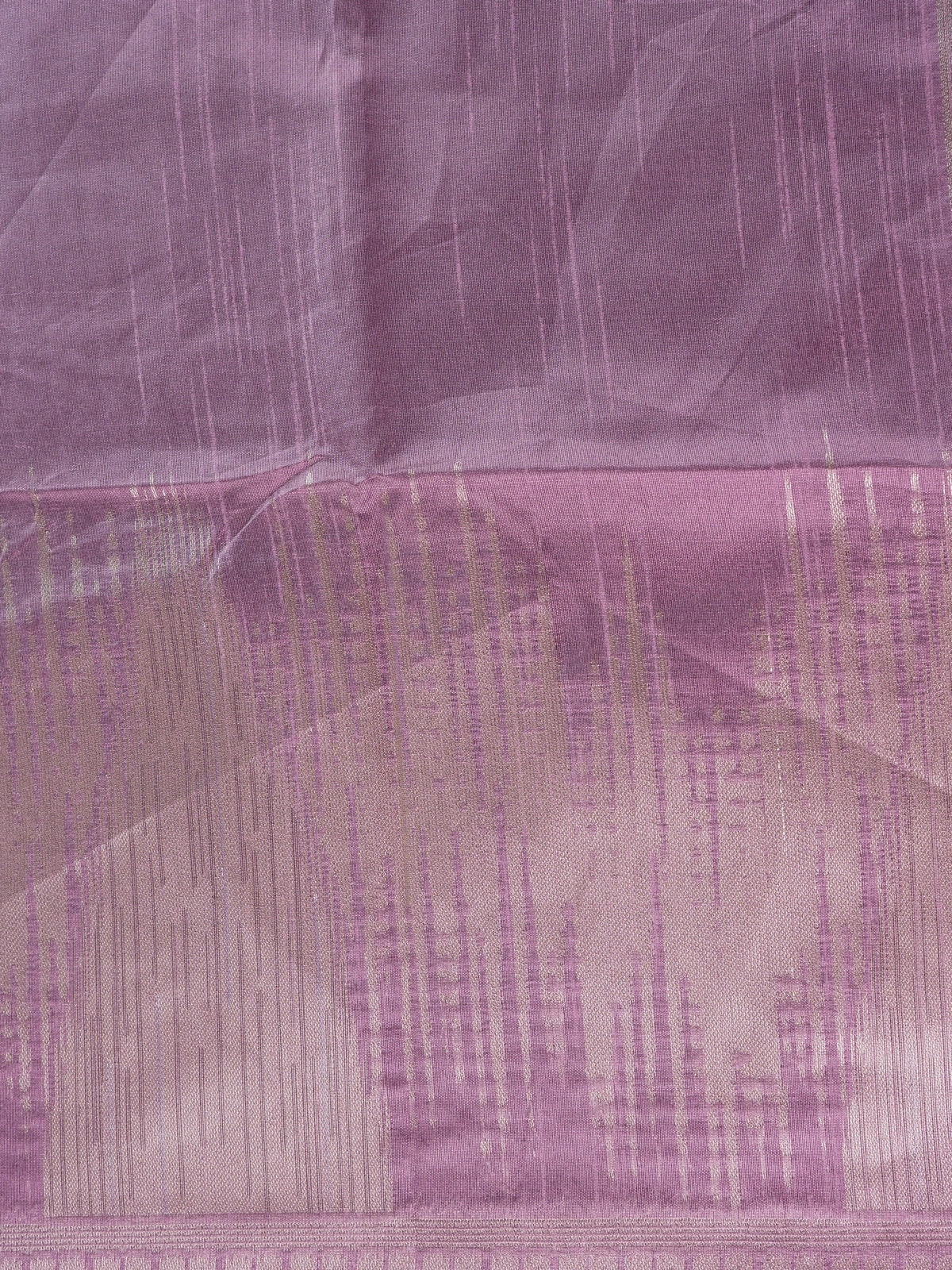 Mauve semi tussar saree with silver zari streaks and temple motif border