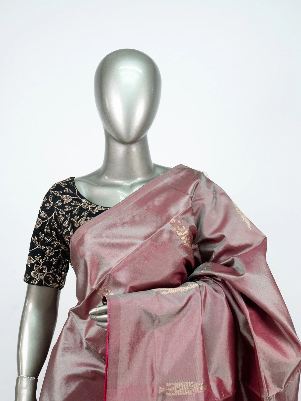 Dusty mauve banana silk saree with contrast pink zari pallu and black embroidered blouse