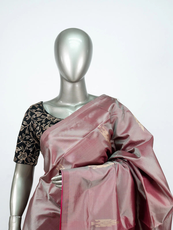 Dusty mauve banana silk saree with contrast pink zari pallu and black embroidered blouse