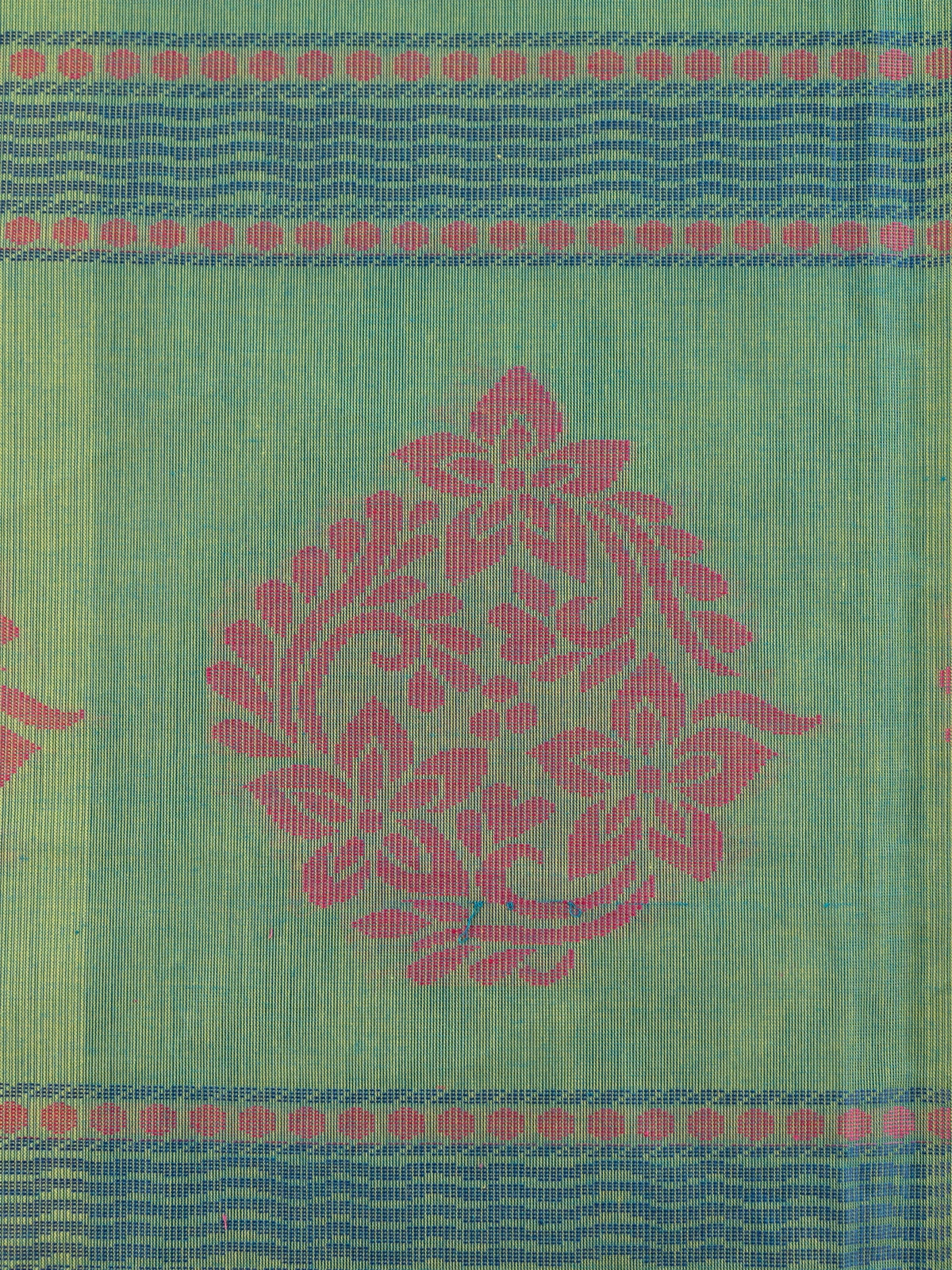 Green silk cotton saree with contrast pink border and pink and blue floral butta motifs