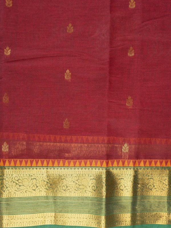 Maroon Chettinad cotton saree with green and gold zari contrast border and gold buttas