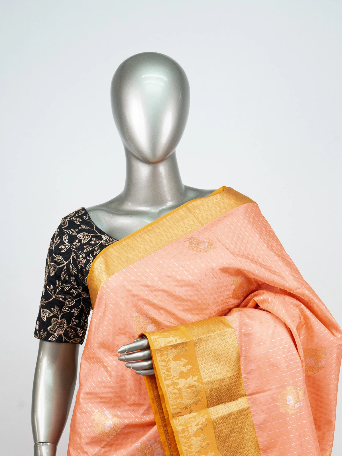 Peach semi silk Vaira Oosi Design saree with mustard-gold contrast zari border and buttas