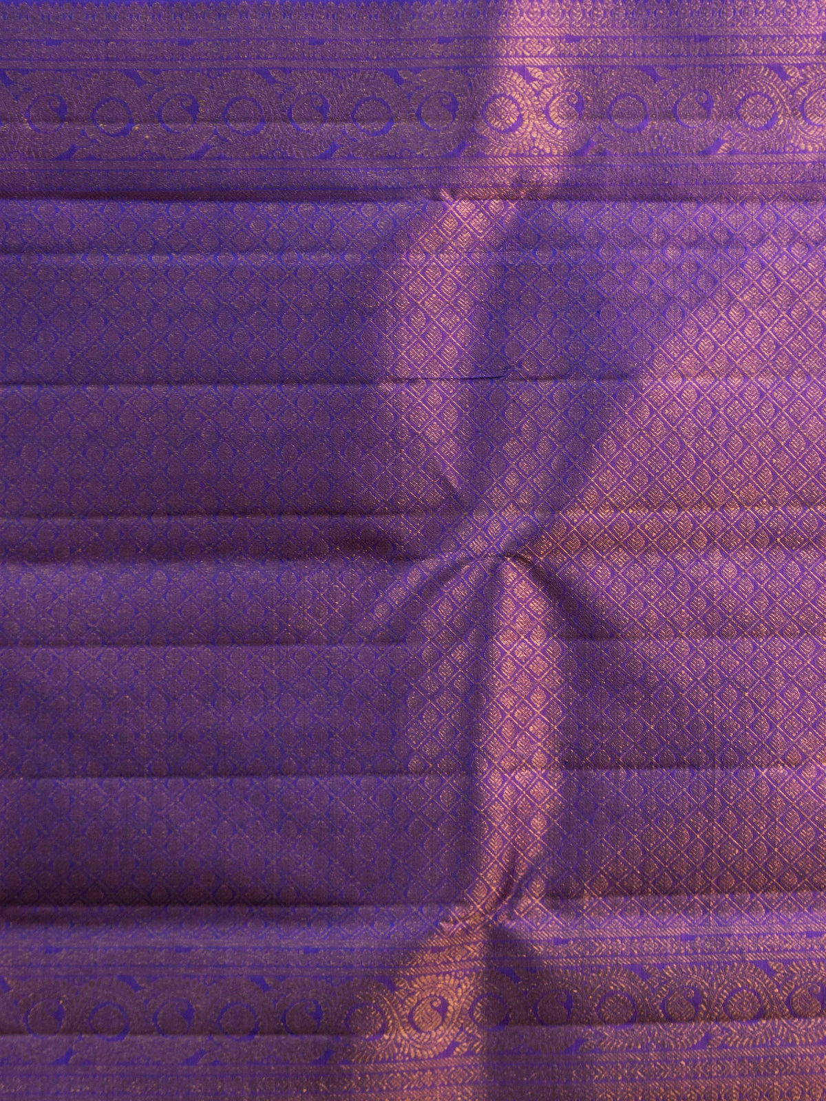 Mauve and violet pure Kanchipuram silk saree with gold zari buttas and contrast violet zari border