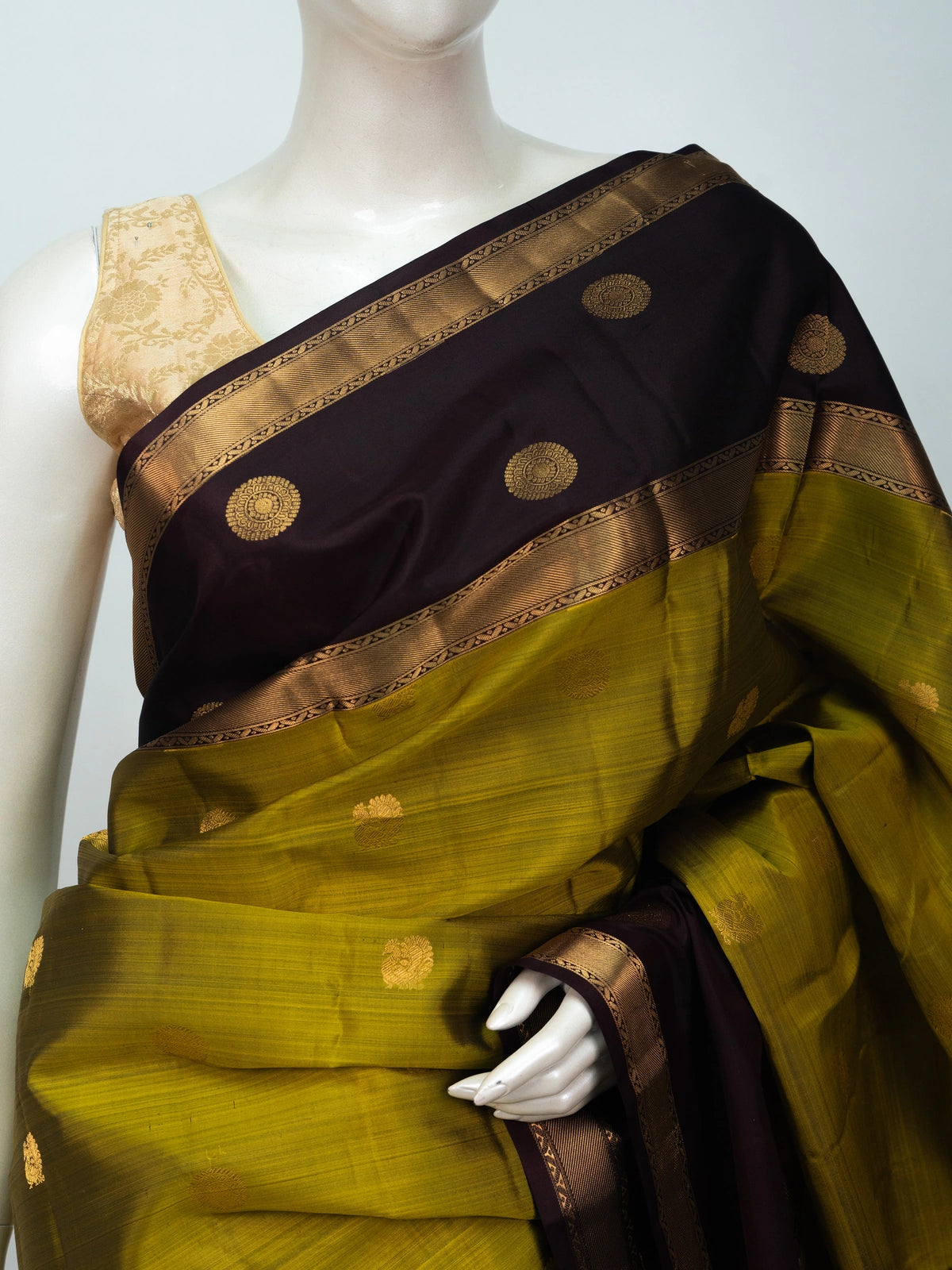 Mehndi green pure Kanchipuram silk saree with maroon contrast border and gold zari buttas
