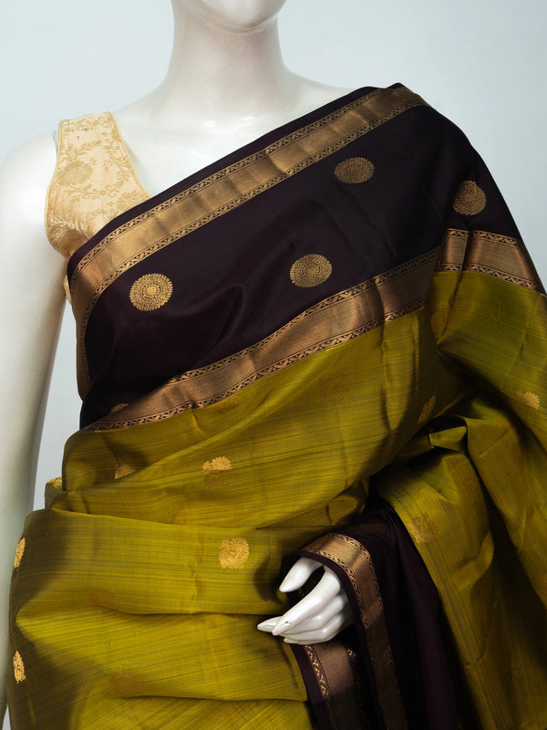 Mehndi green pure Kanchipuram silk saree with maroon contrast border and gold zari buttas