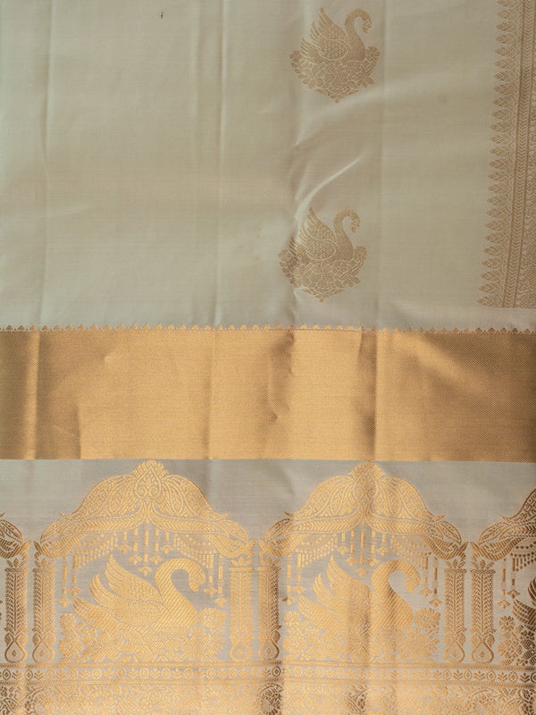 Cream Pure Kanchipuram silk saree with gold zari swan motifs and broad zari border