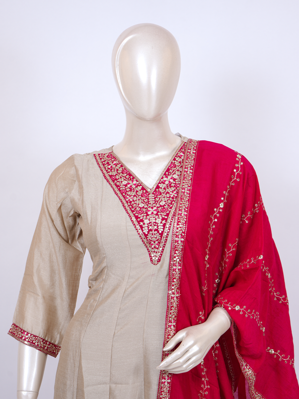 Beige embroidered kurti set with rani pink zari dupatta and straight pants