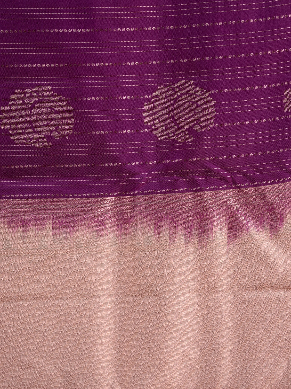 Purple pure Kanchipuram silk saree with peach zari contrast border and paisley zari buttas