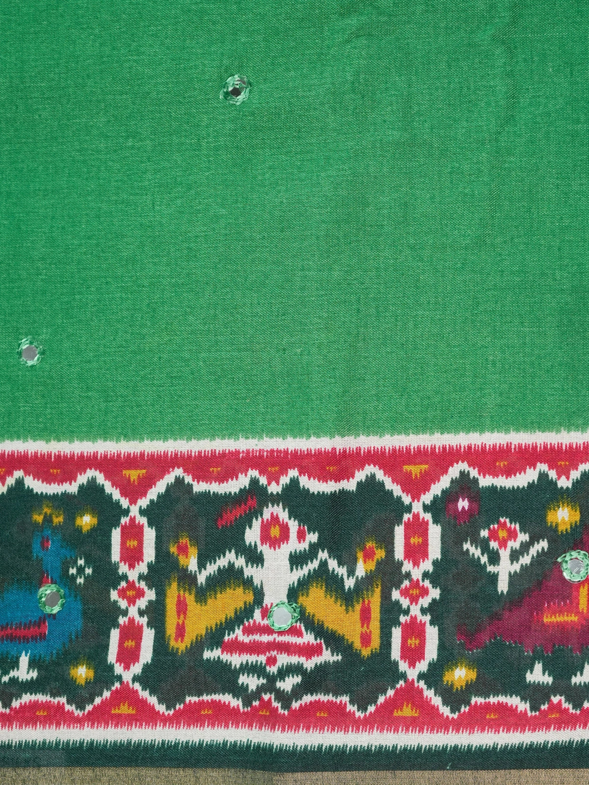 Green linen cotton saree with red patola ikat border, mirror work and multicolour pallu motifs