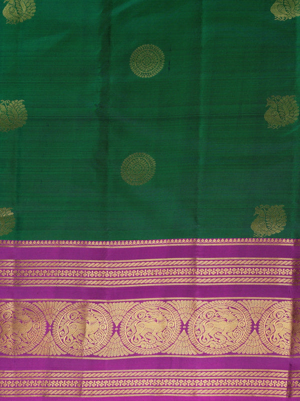 Green pure Kanchipuram silk saree with contrast magenta gold zari border and buttas