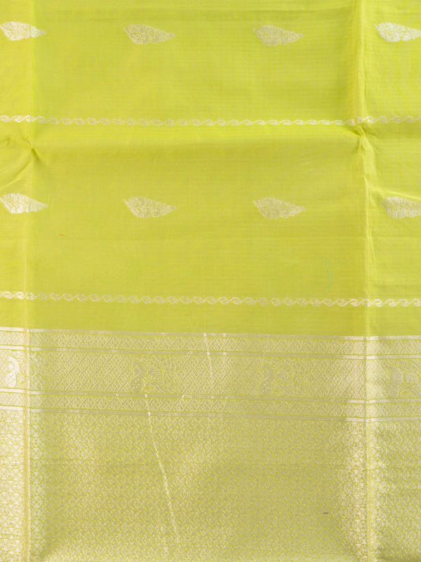 Lime green silk cotton saree with silver zari border and buttas