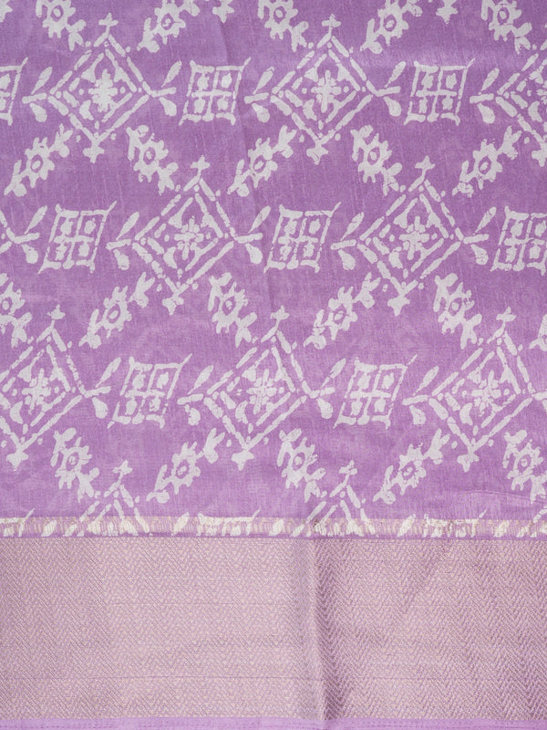Lavender and white designer saree with batik-style print and zari border