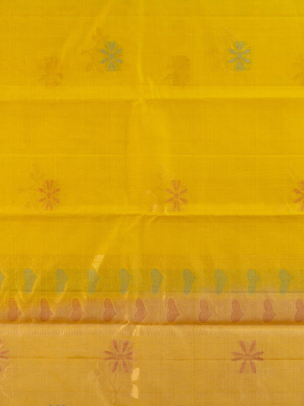 Bright yellow pure silk cotton saree with floral buta motifs and gold zari border
