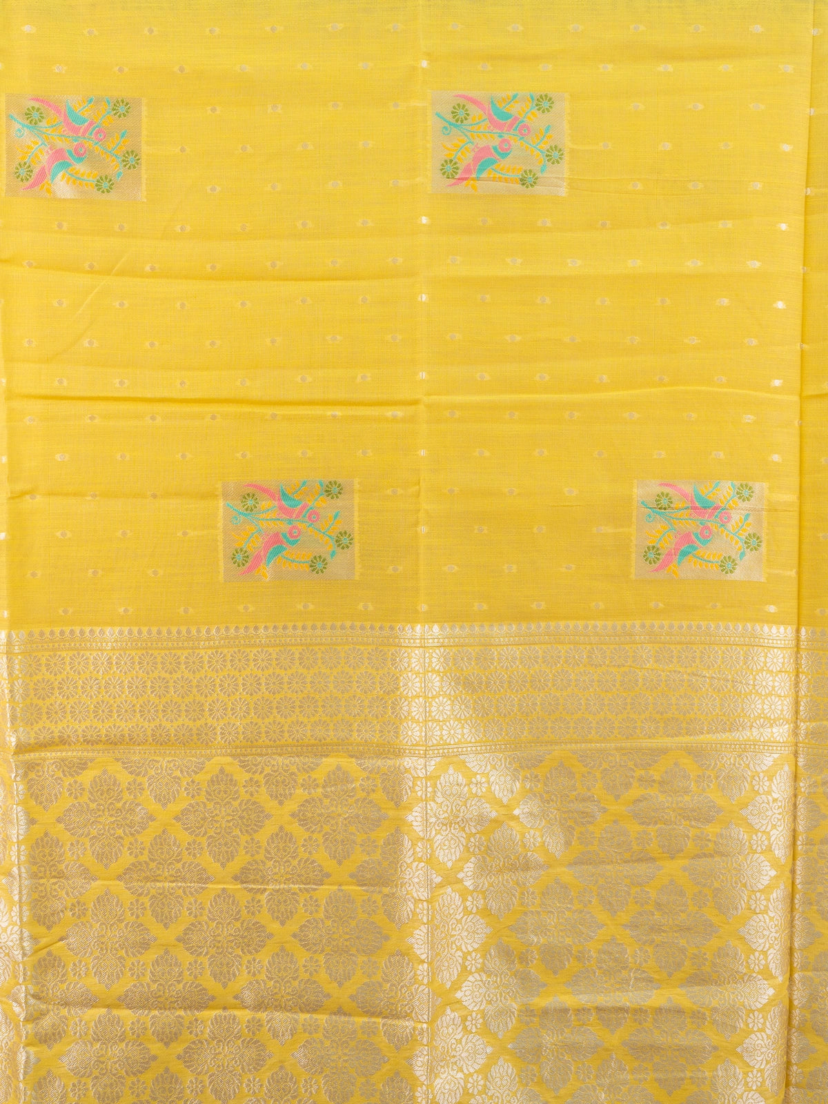 Bright yellow linen cotton saree with silver butis, multicolour bird motifs and gold zari border