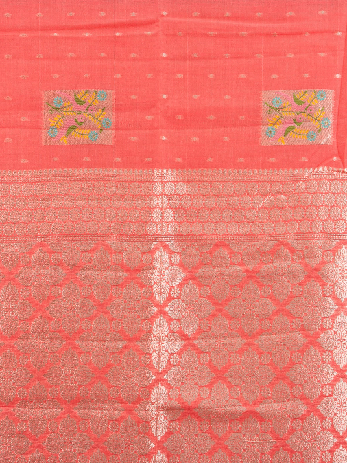 Coral linen cotton saree with silver zari border, floral butti motifs and trellis-work pallu