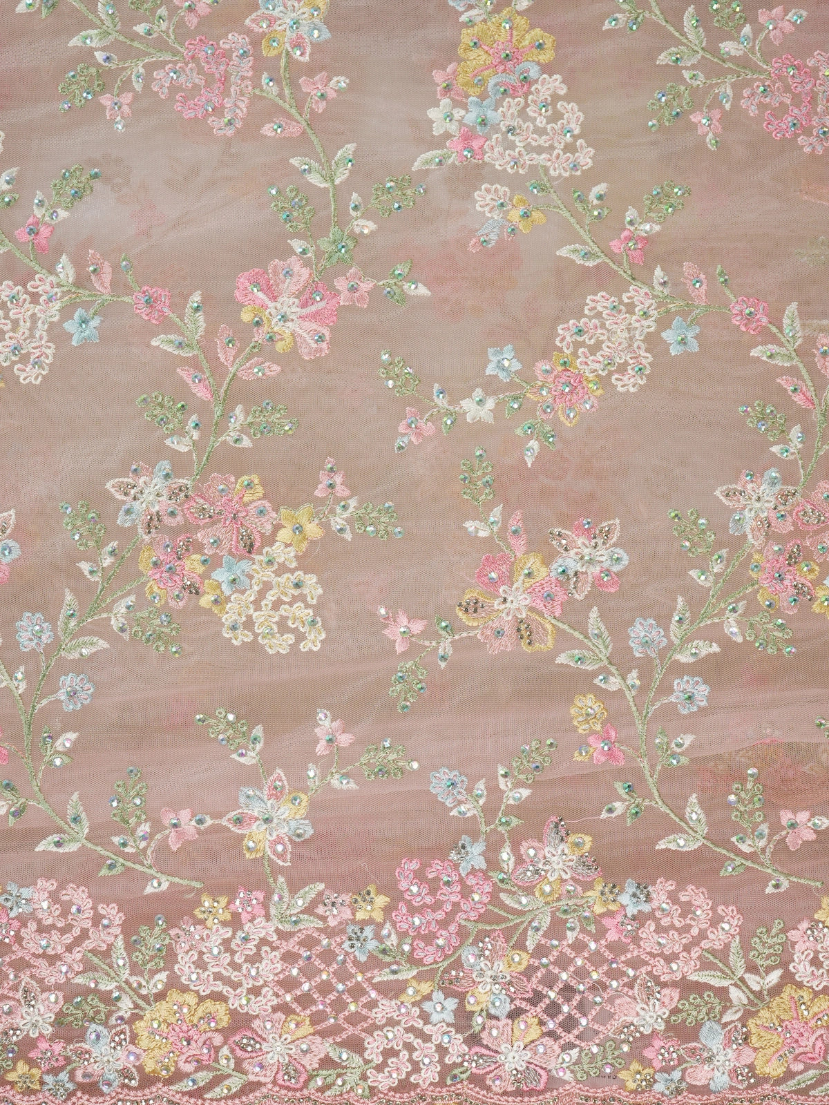 Soft pink net designer saree with pastel multicolour floral embroidery and scalloped border
