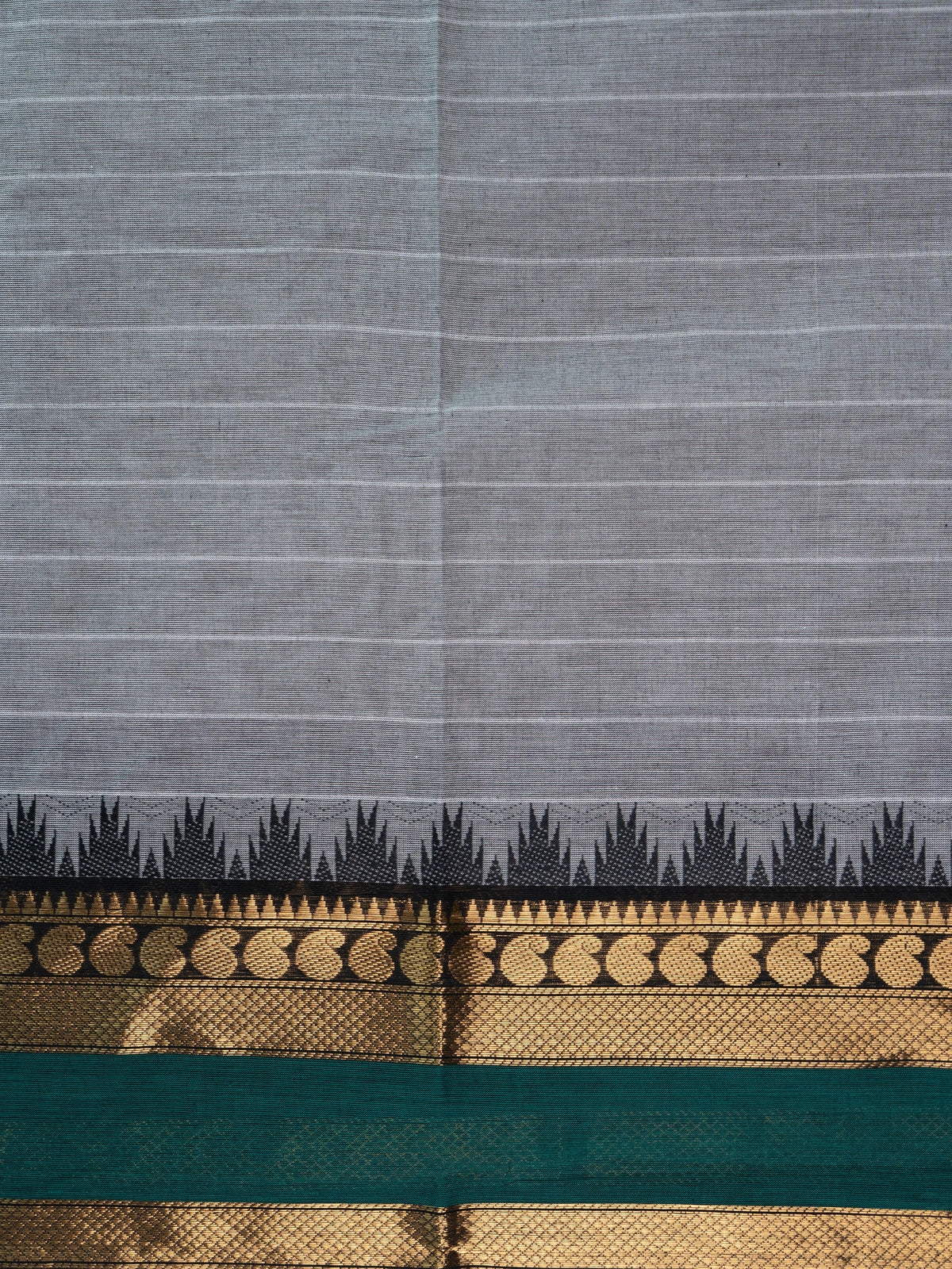 Grey Chettinad cotton saree with fine white stripes and contrast green gold zari temple border