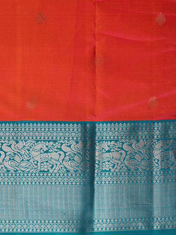 Pink and teal pure Kanchipuram silk saree with silver zari peacock border and gold buttas