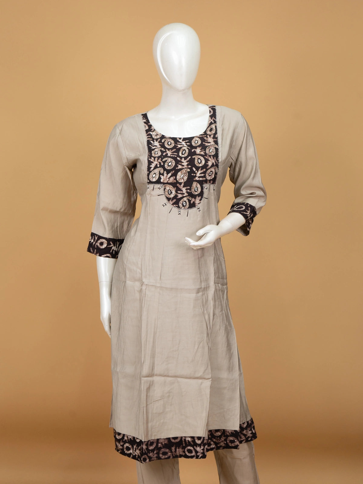 Grey batik cotton A-line kurti set with mirror work yoke and black batik dupatta with gold zari border