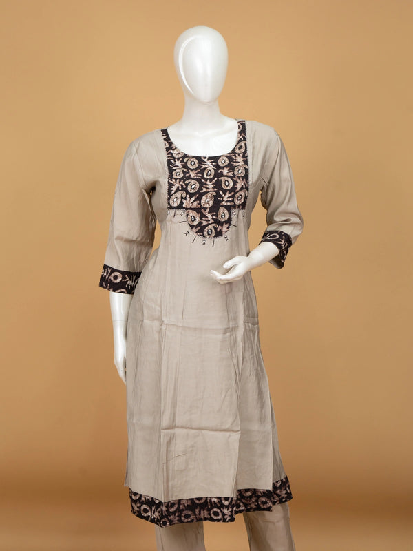 Grey batik cotton A-line kurti set with mirror work yoke and black batik dupatta with gold zari border
