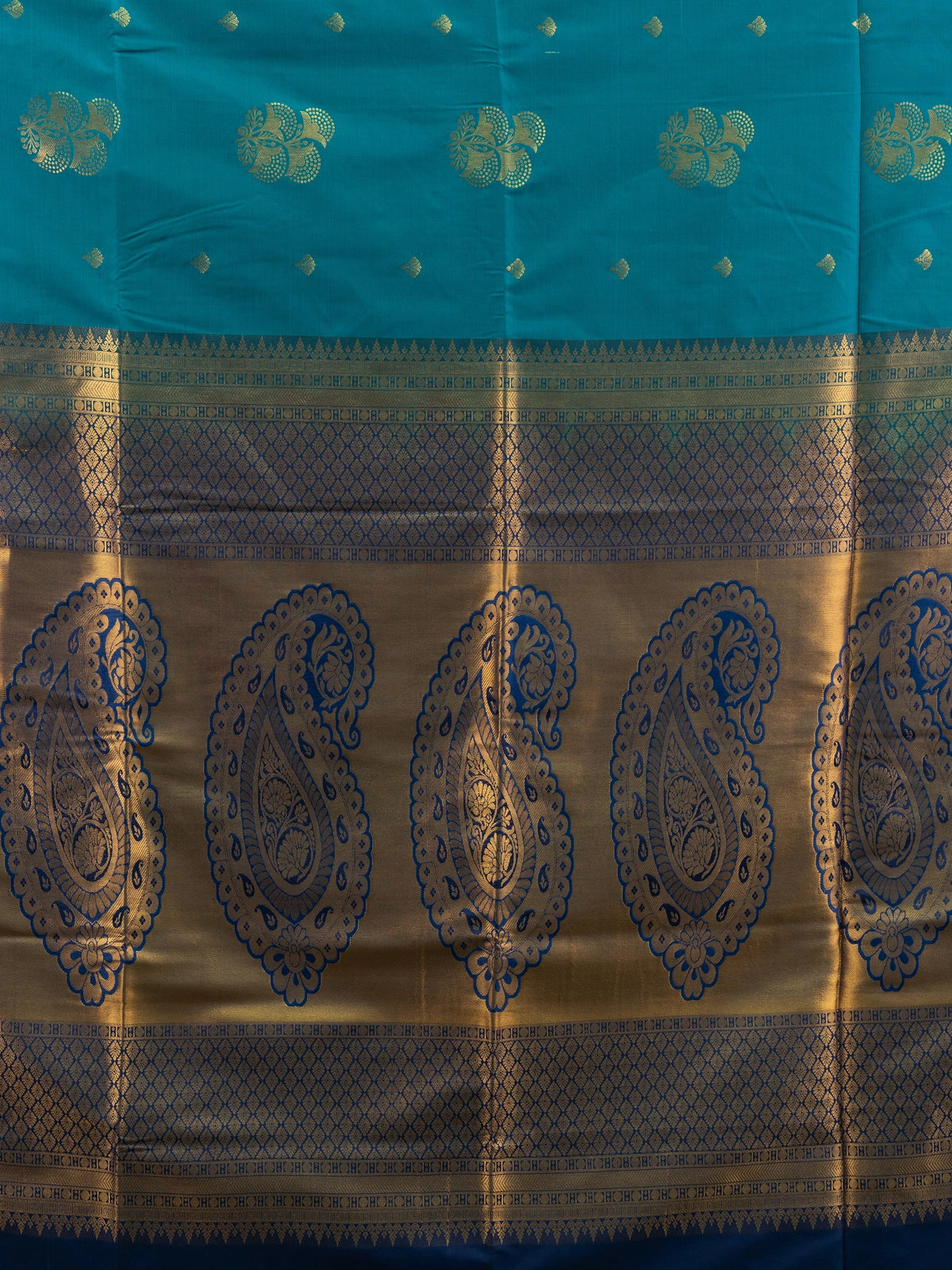 Peacock teal Kanchipuram Fancy Silk saree with contrast navy border and gold zari paisley pallu
