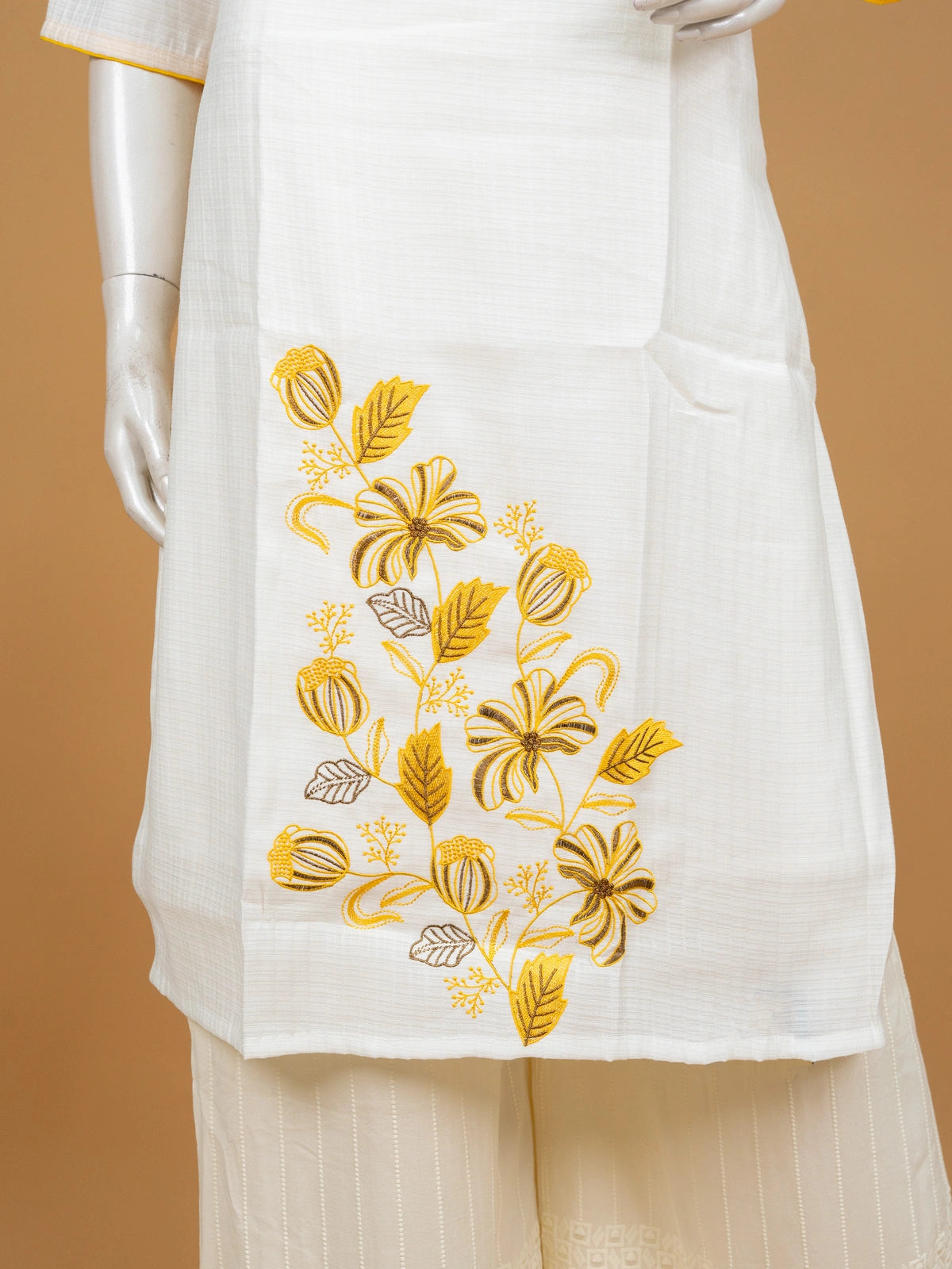 White cotton Anarkali kurti with yellow floral embroidery on neckline and hem