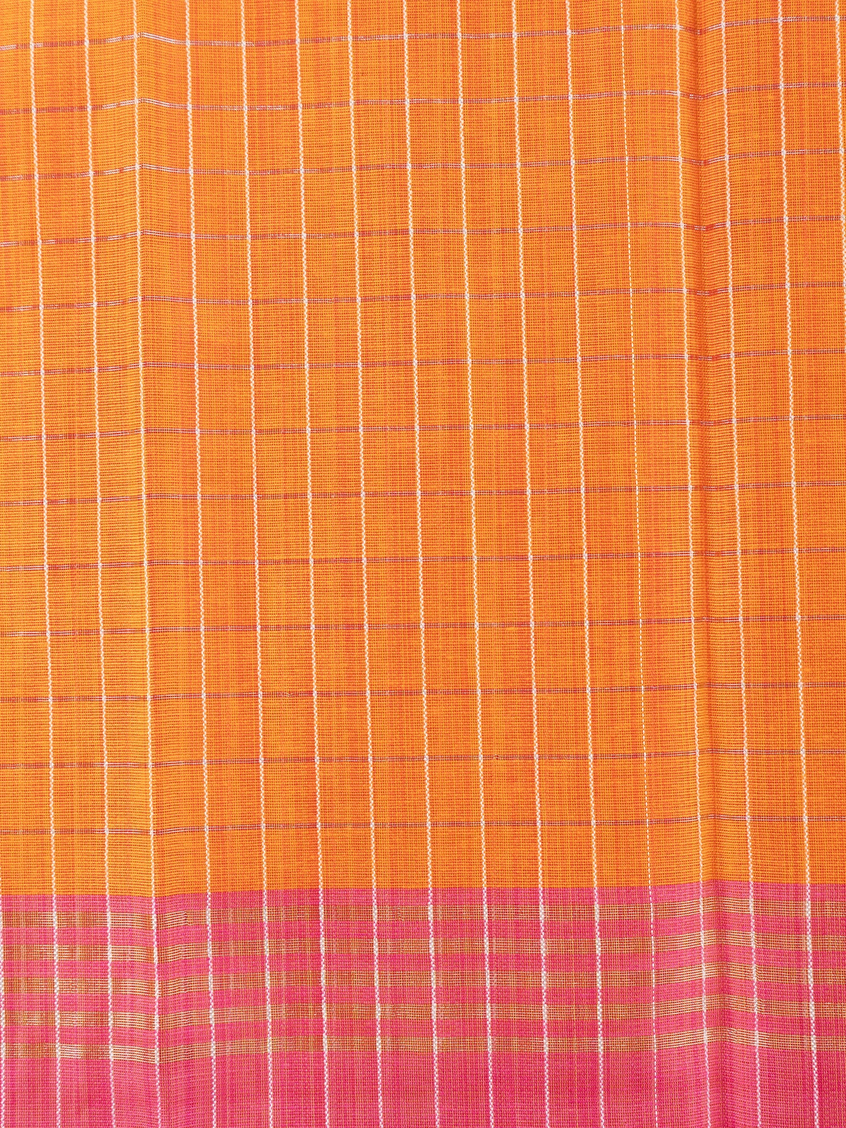 Orange linen cotton saree with white checks, contrast pink border with gold zari, and striped pink blouse