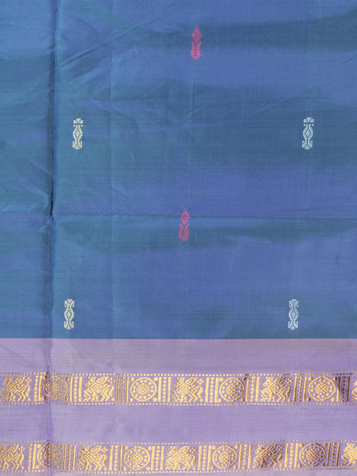 Peacock blue-green banana silk saree with lavender gold zari border and cream zari pallu