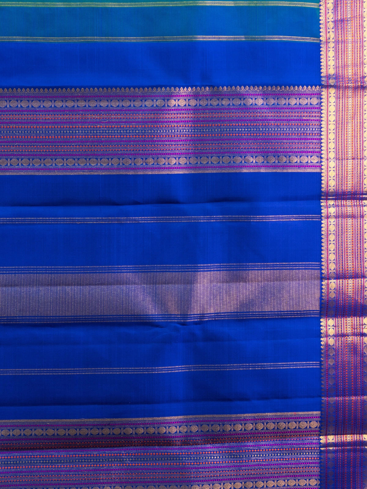 Peacock teal pure Kanchipuram silk saree with contrast royal blue gold zari border and woven pallu